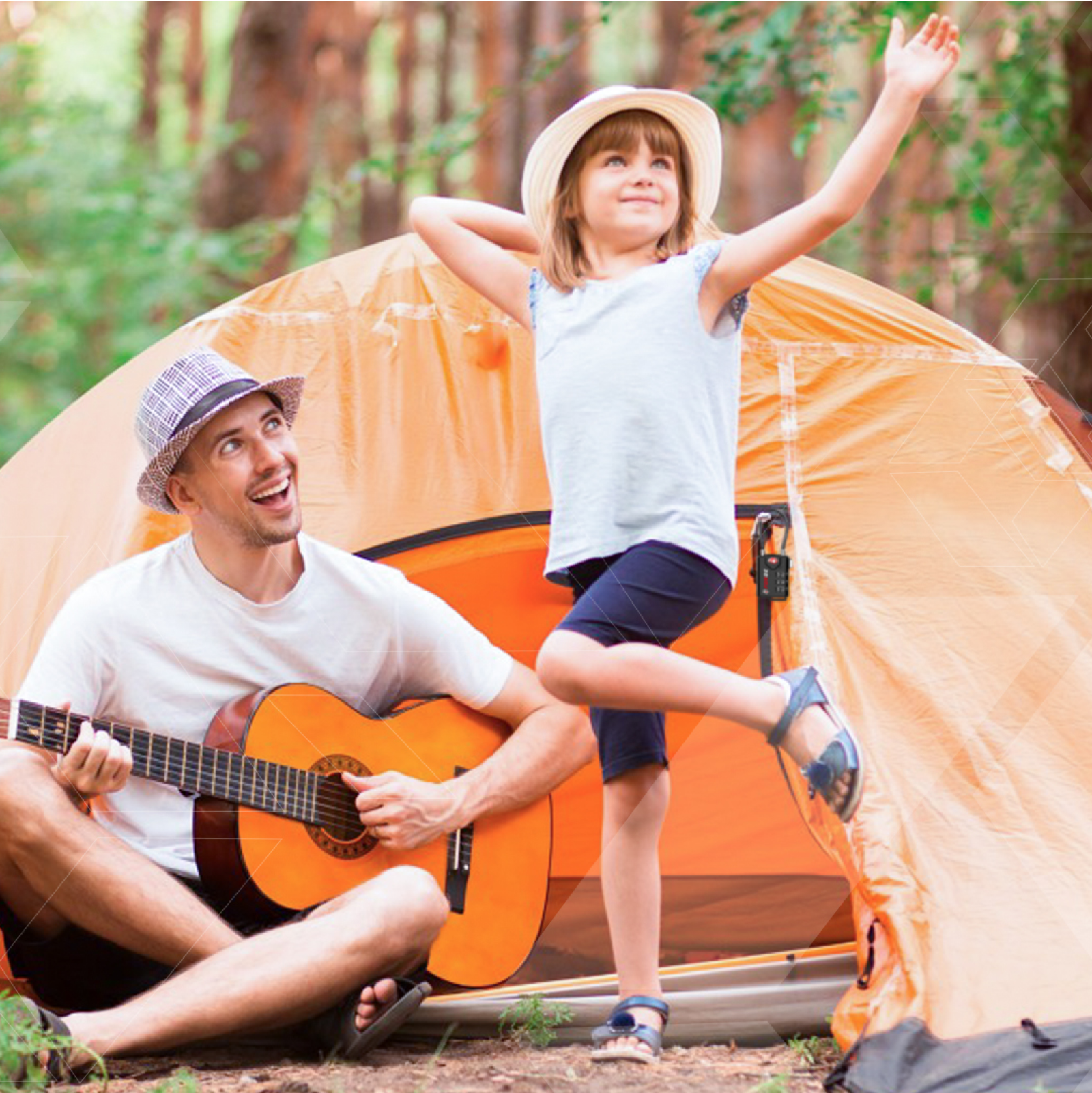 Child dancing joyfully outside an orange tent while an adult plays guitar nearby in a forest setting, with a combination lock securing the tent.